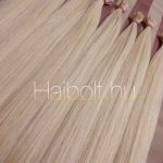 Enyhén hamvas tincsezett platina szőke 45-47 cm 100% eredeti emberi haj/ 10gr