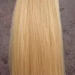 Méz szőke 100% emberi hajból készült csatos haj kb. 110-115 gr 60 cm